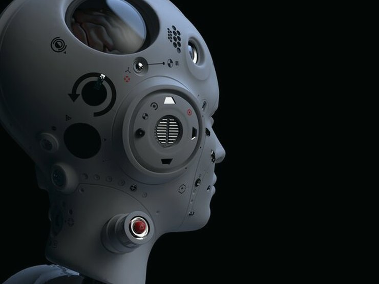 A grey robot head in profile on a black background